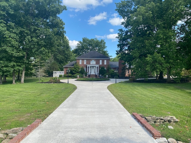 view of front of property with a front lawn