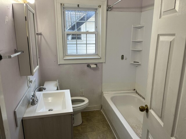 full bathroom featuring shower / bath combination, toilet, tile patterned floors, and vanity