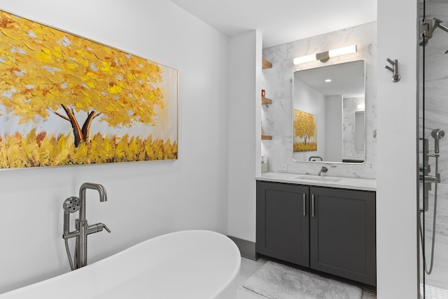 bathroom featuring shower with separate bathtub, tile patterned floors, and vanity