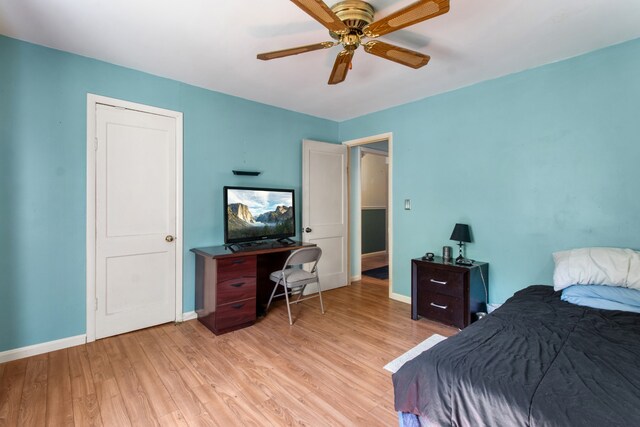 bedroom featuring ceiling fan and light hardwood / wood-style flooring