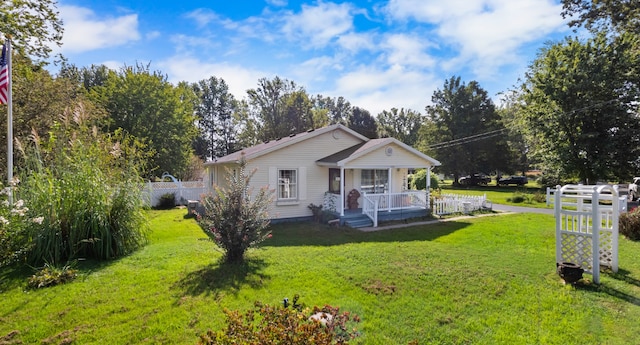 view of front of house featuring a front lawn and a porch