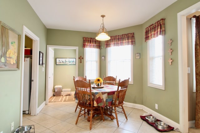 dining room featuring light tile patterned floors