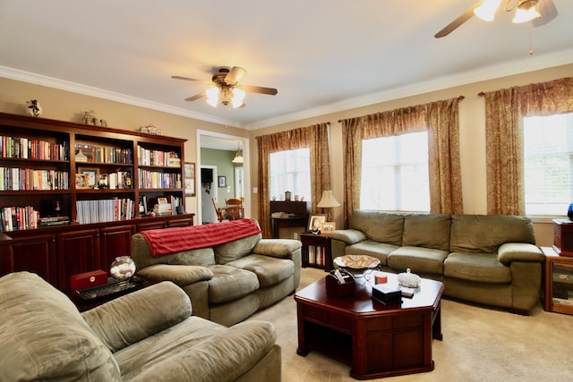 living room featuring crown molding, light carpet, and ceiling fan