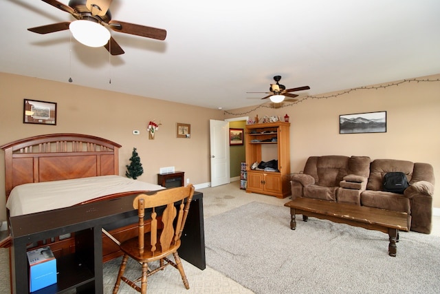 bedroom with ceiling fan and carpet floors