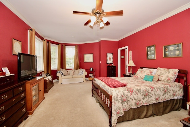 bedroom featuring ceiling fan, light carpet, and ornamental molding