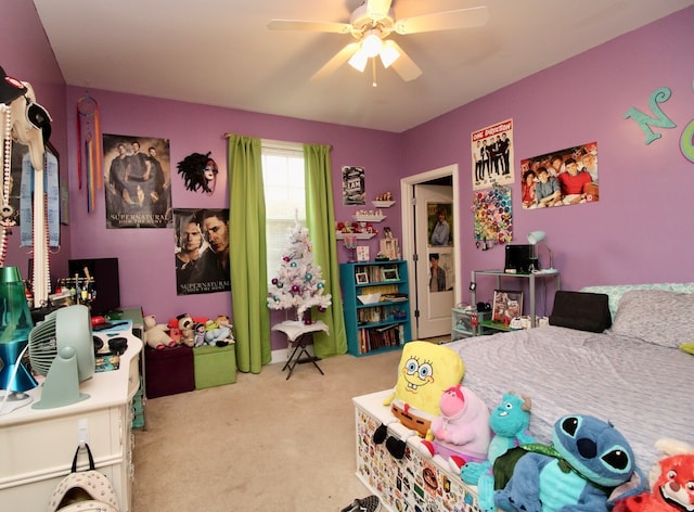 carpeted bedroom featuring ceiling fan