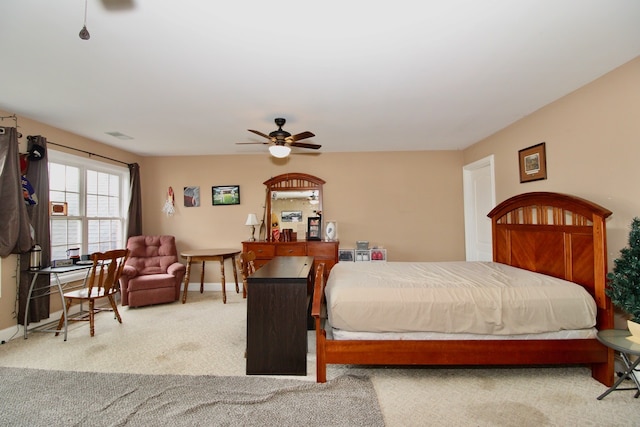 bedroom featuring ceiling fan and carpet flooring