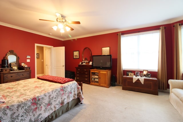 bedroom featuring ceiling fan, light colored carpet, and crown molding