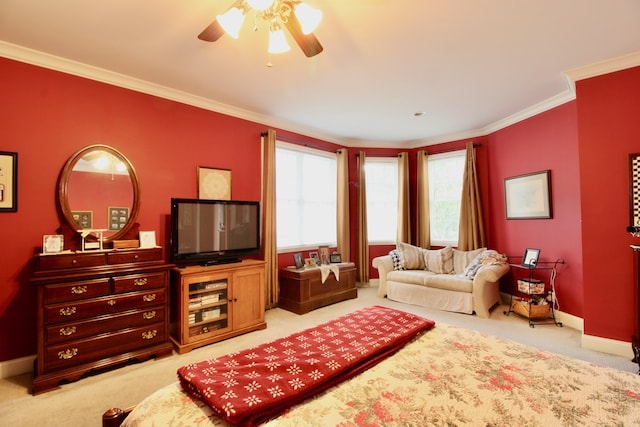 carpeted living room with crown molding and ceiling fan