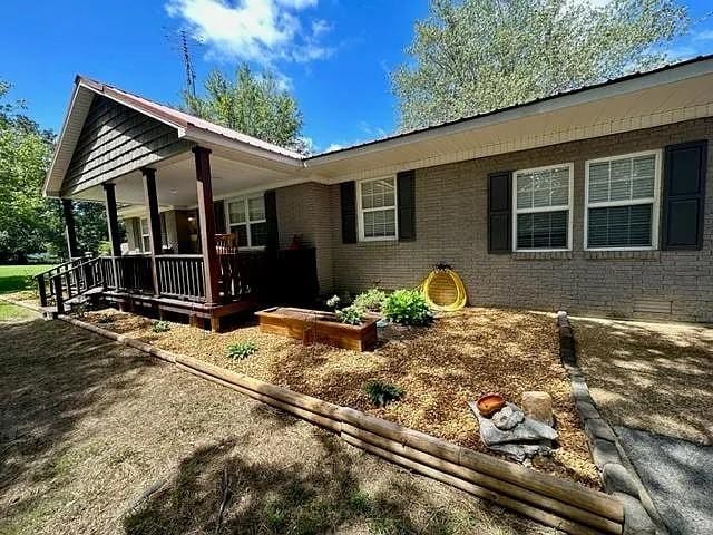 exterior space featuring covered porch