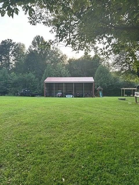 view of yard featuring a carport