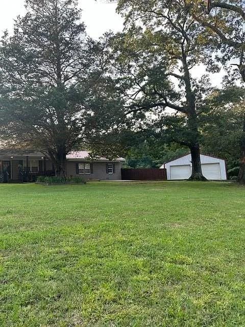 view of yard featuring a garage