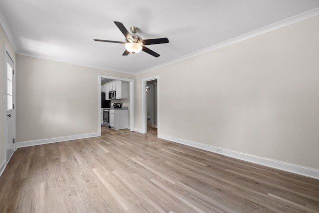 unfurnished room with ceiling fan, light hardwood / wood-style flooring, and ornamental molding