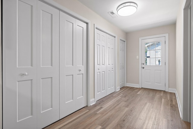 foyer featuring light wood-type flooring