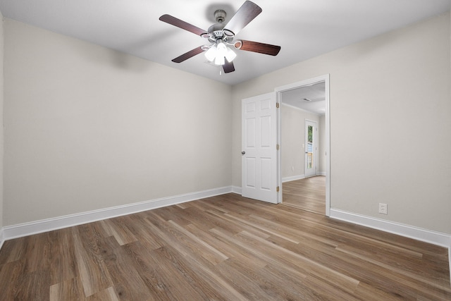 spare room featuring ceiling fan and wood-type flooring