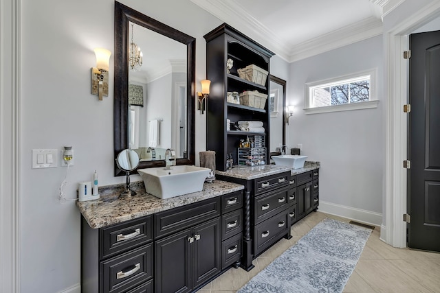 bathroom with tile patterned floors, vanity, and ornamental molding