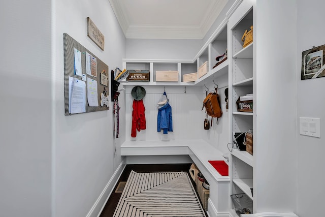 mudroom featuring ornamental molding and hardwood / wood-style flooring