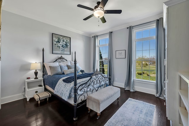 bedroom with ceiling fan, hardwood / wood-style floors, and crown molding