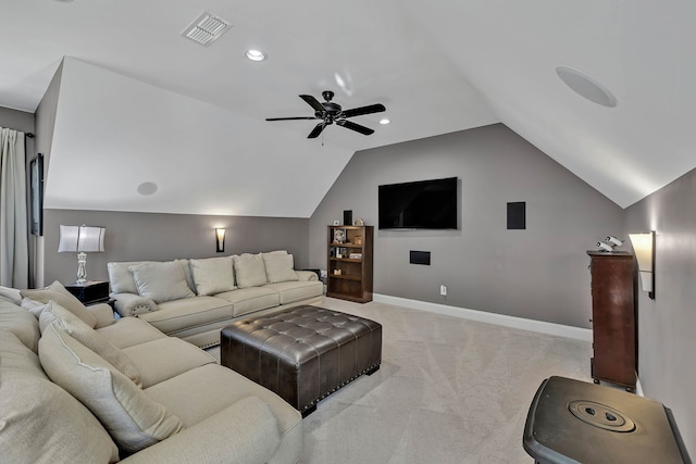 carpeted cinema with ceiling fan and lofted ceiling