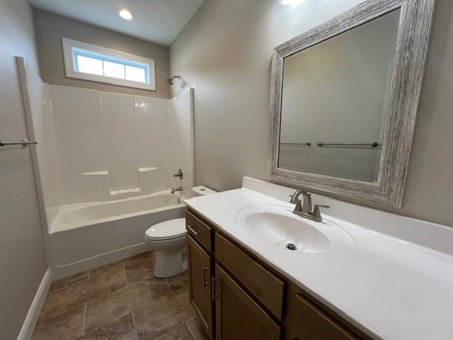 full bathroom featuring shower / bath combination, toilet, vanity, and tile patterned flooring