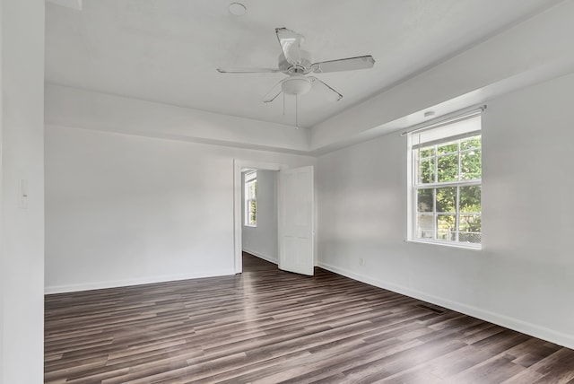 empty room featuring hardwood / wood-style floors and ceiling fan