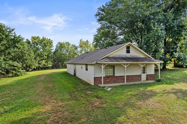 view of home's exterior featuring a yard