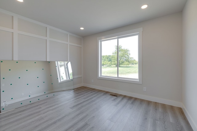 unfurnished bedroom featuring light hardwood / wood-style floors