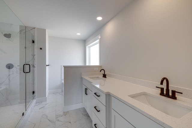 bathroom with tile patterned floors, walk in shower, and double vanity