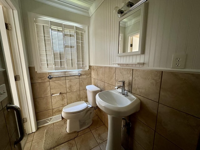1716 Keller Ave, Pulaski, TN 38478 - bathroom with crown molding, toilet, visible vents, and tile patterned flooring