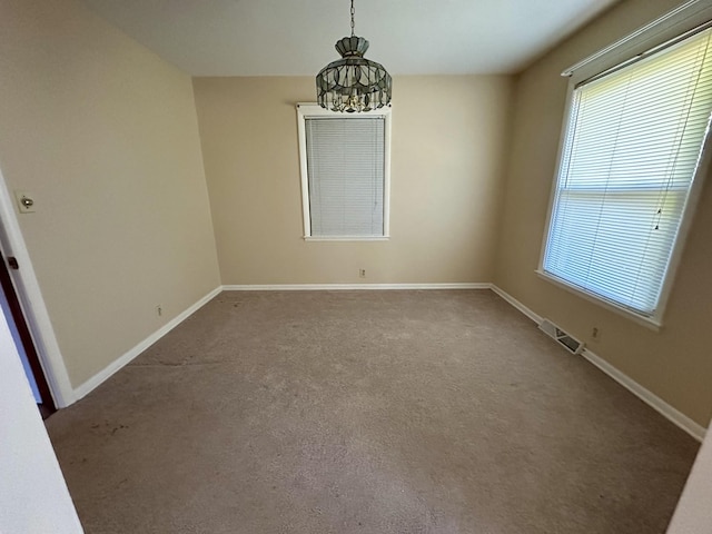 1716 Keller Ave, Pulaski, TN 38478 - interior space featuring visible vents, a chandelier, carpet flooring, and baseboards