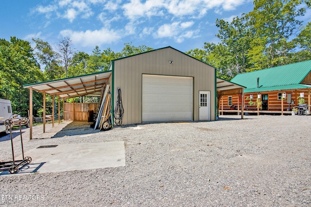 garage featuring a carport