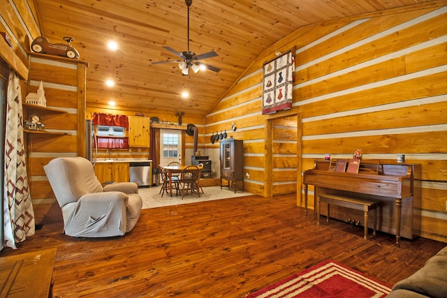 living room featuring a wood stove, ceiling fan, wood-type flooring, vaulted ceiling, and wood ceiling