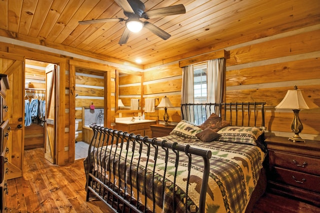 bedroom with hardwood / wood-style flooring, ceiling fan, and wood ceiling