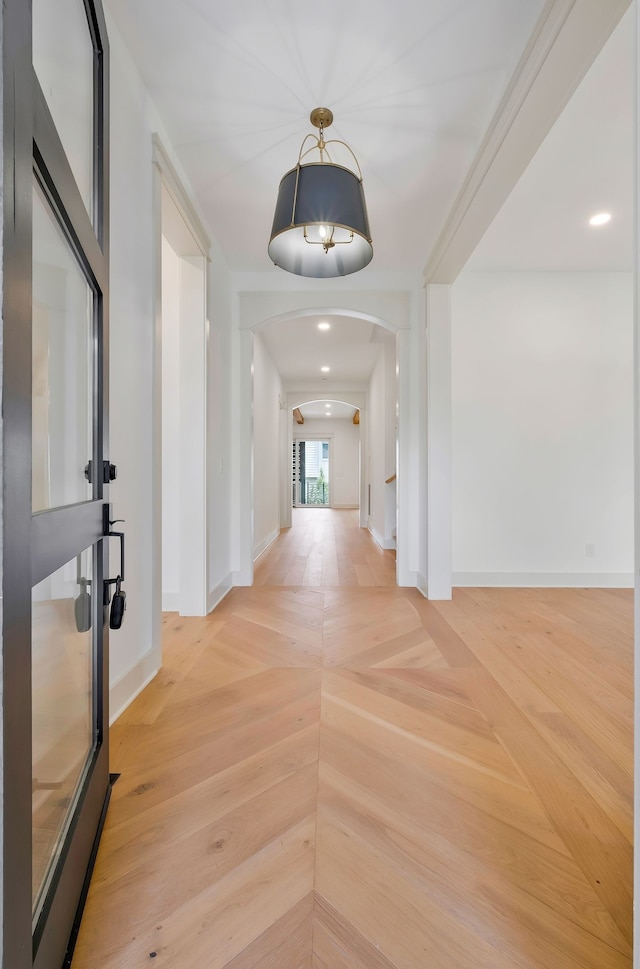 entryway with light parquet floors