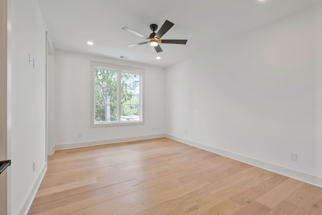 unfurnished room with light hardwood / wood-style floors and ceiling fan