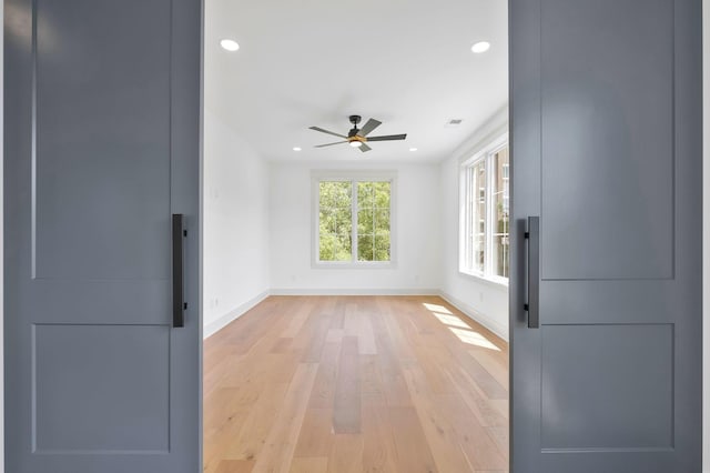 spare room with light wood-style floors, recessed lighting, ceiling fan, and baseboards