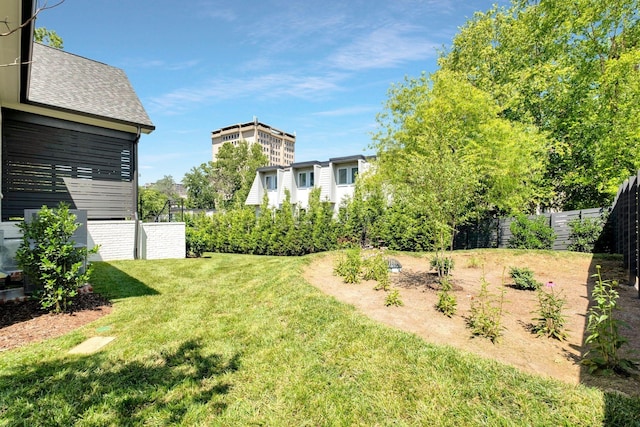 view of yard featuring a fenced backyard