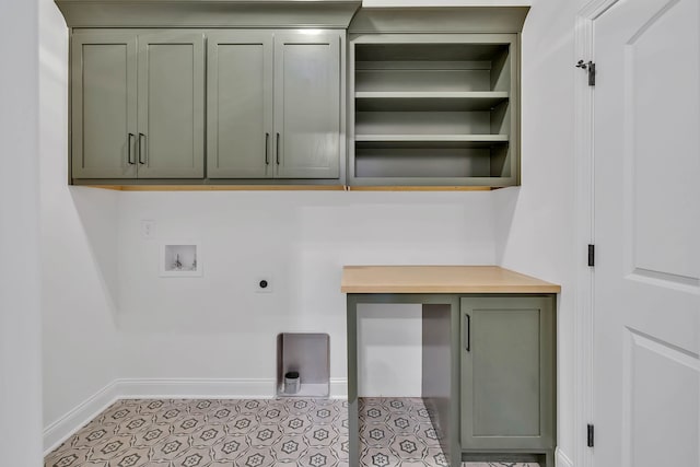 laundry room with hookup for a washing machine, cabinets, and hookup for an electric dryer