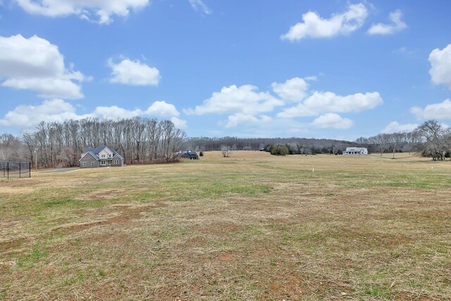 view of yard featuring a rural view