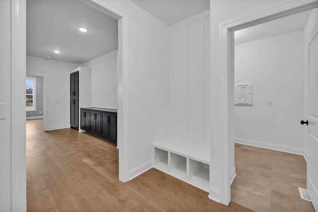 hallway featuring light hardwood / wood-style flooring