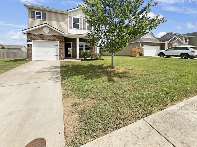 view of front of house with a front yard, concrete driveway, brick siding, and fence