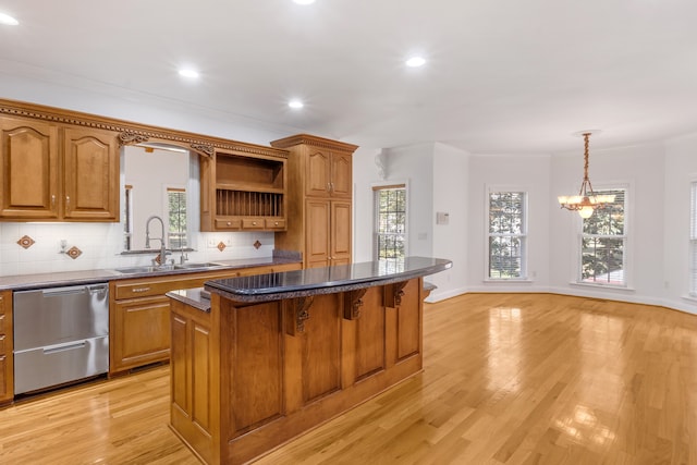 kitchen featuring a sink, a kitchen island, stainless steel dishwasher, open shelves, and brown cabinetry