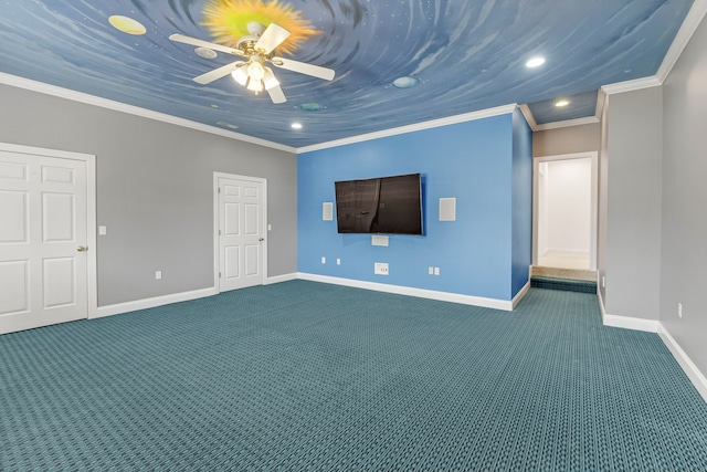 unfurnished living room featuring ceiling fan, crown molding, and dark colored carpet