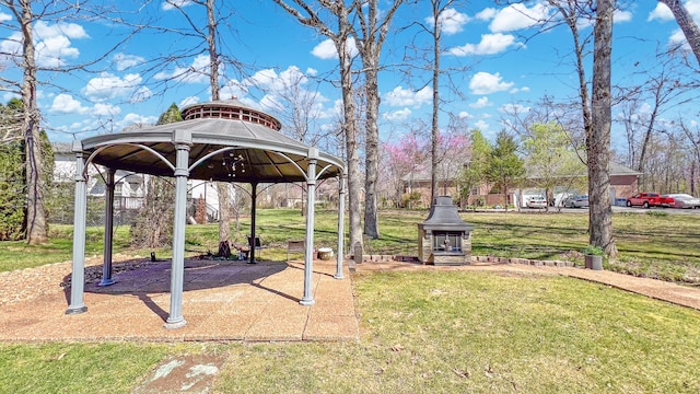 view of yard featuring a gazebo and a carport