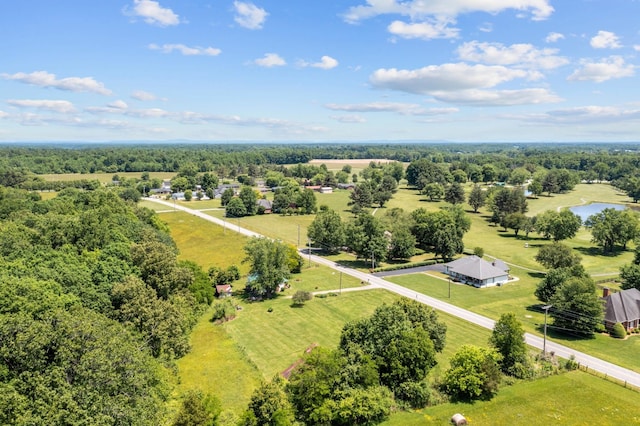 birds eye view of property featuring a rural view and a water view