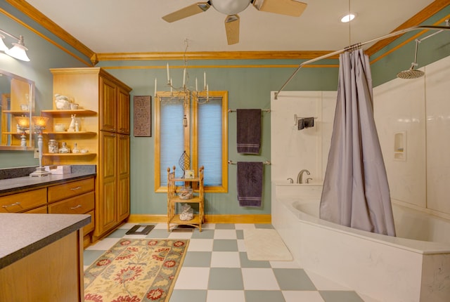 bathroom featuring a tub to relax in, tile patterned flooring, vanity, ceiling fan, and crown molding