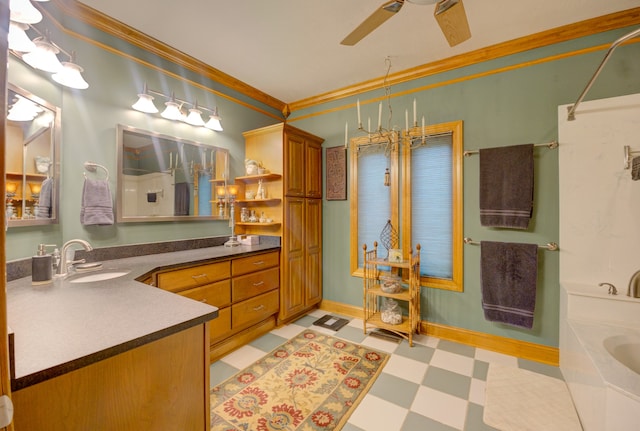 bathroom featuring ceiling fan, vanity, a tub to relax in, tile patterned floors, and ornamental molding