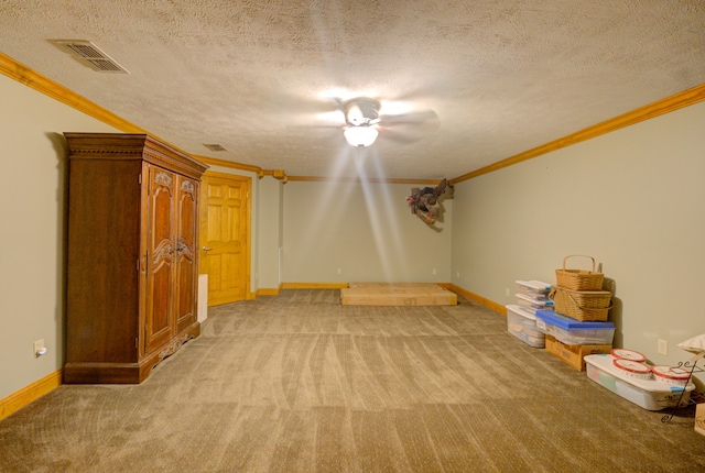 interior space with a textured ceiling and light carpet