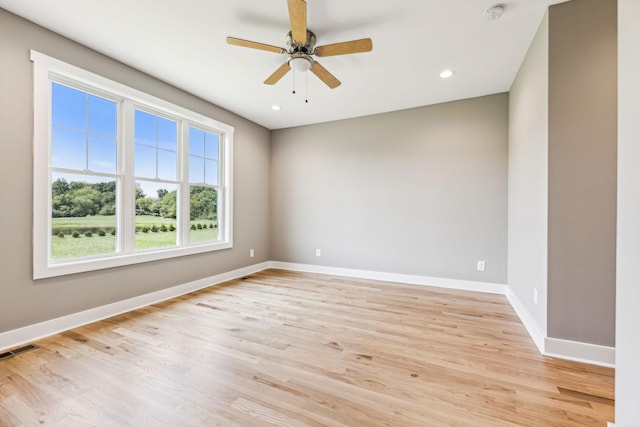 empty room with ceiling fan, light wood-style flooring, recessed lighting, visible vents, and baseboards