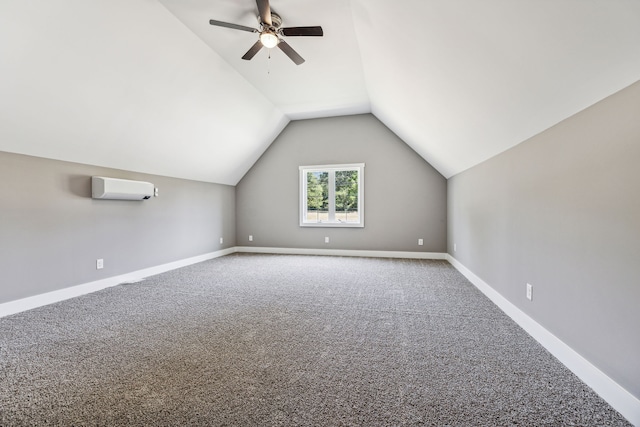 additional living space featuring a wall mounted air conditioner, carpet flooring, ceiling fan, and lofted ceiling